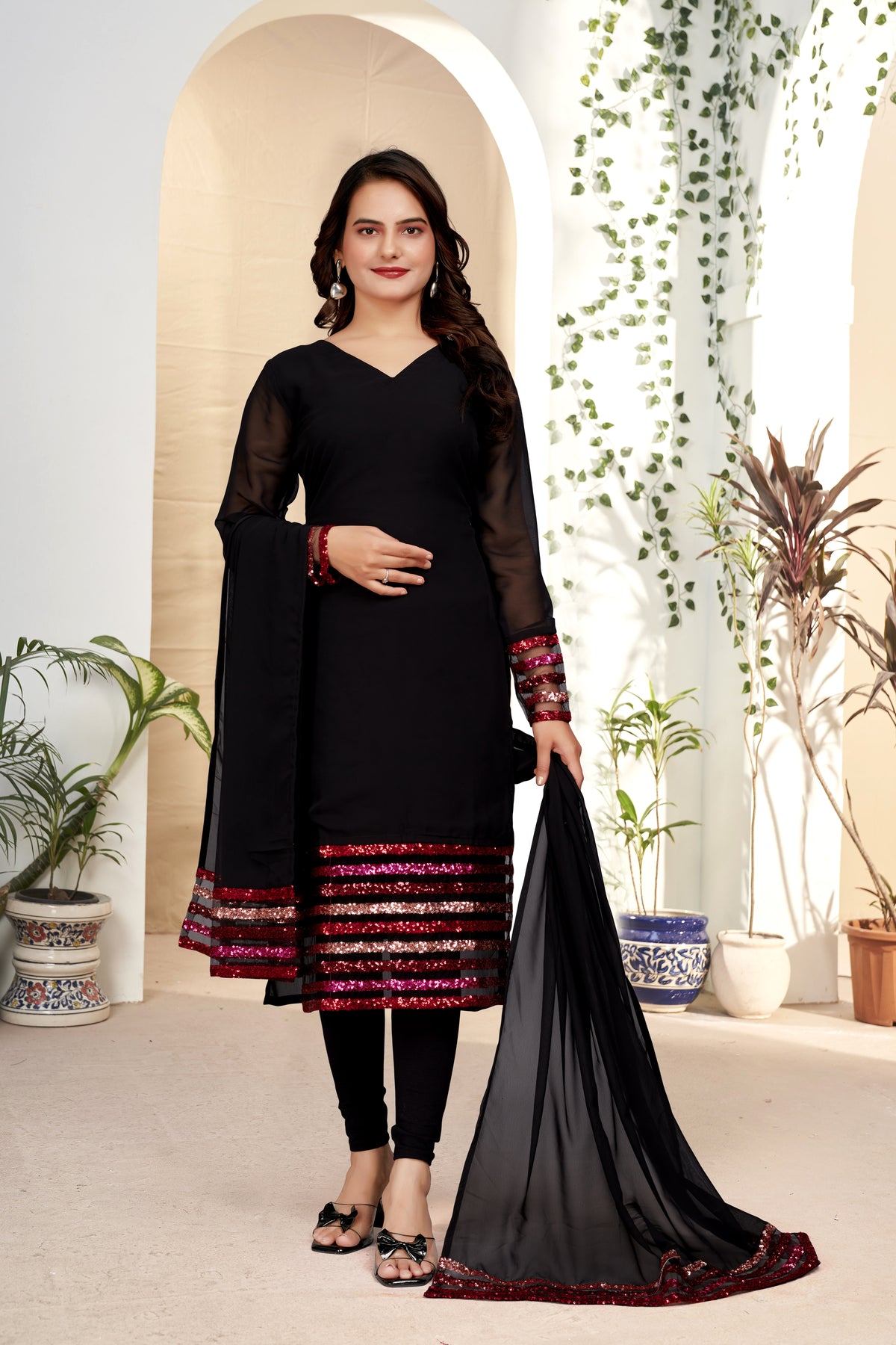 An elegant black kurti with dupatta adorned with beautiful embroidery on georgette fabric.